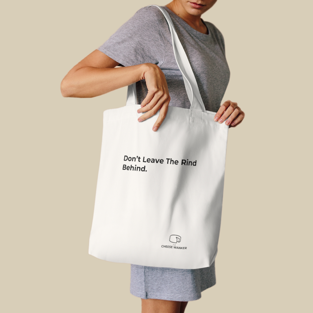 Female Cheese lover carrying Don't Leave the Rind Behind Market Bag