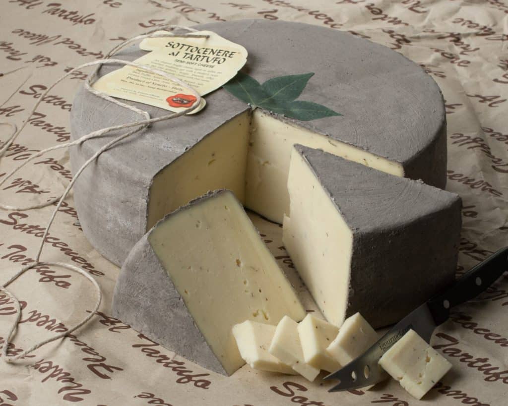 Whole wheel of Sottocenere with natural grey rind