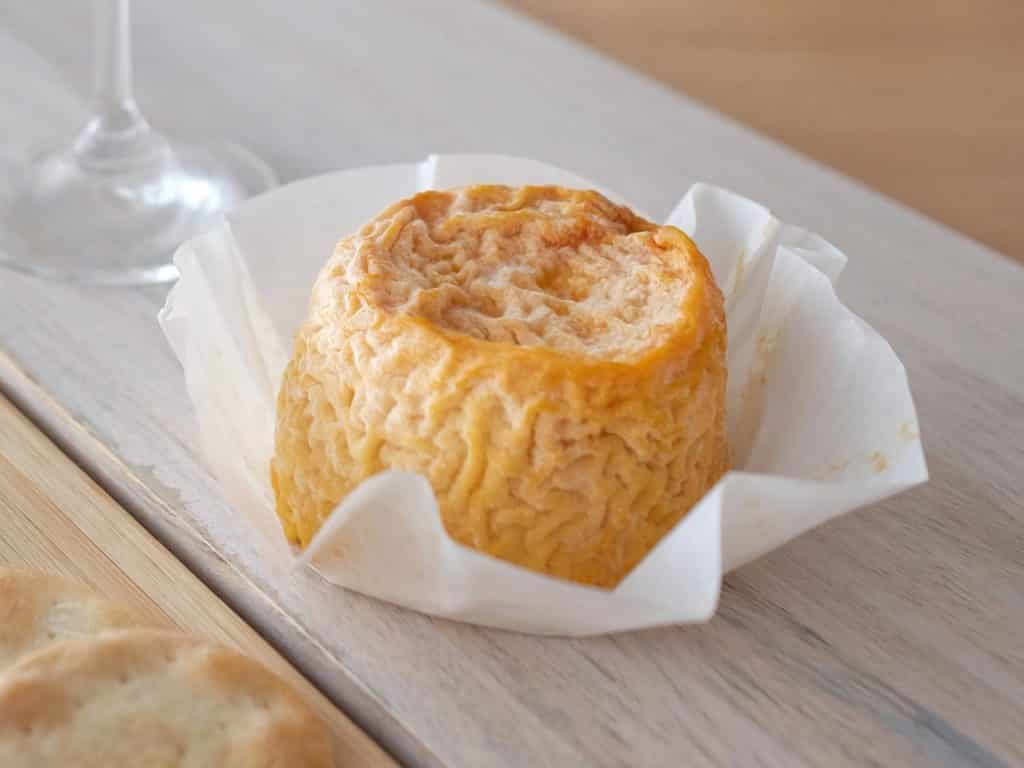 Small orange wrinkly cheese called Langres