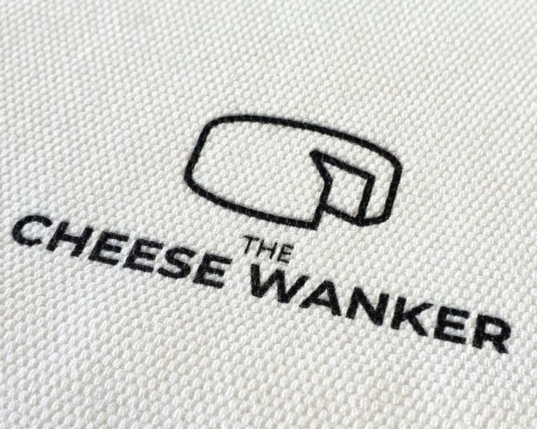 Close up The Cheese Wanker logo on bag