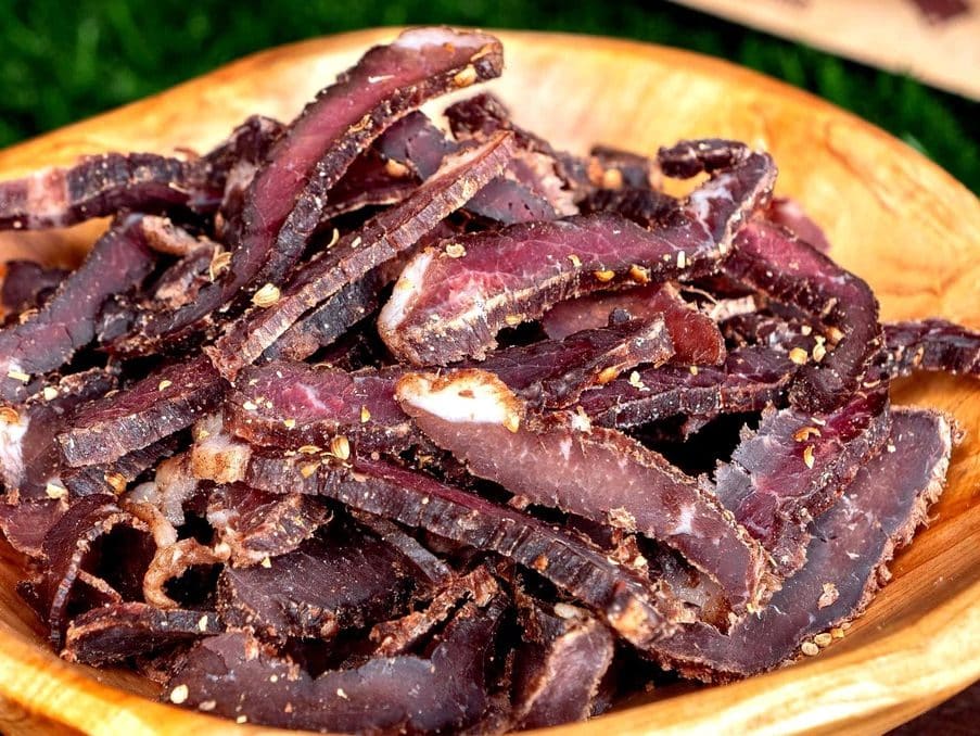 Sliced cured meat Biltong on a plate