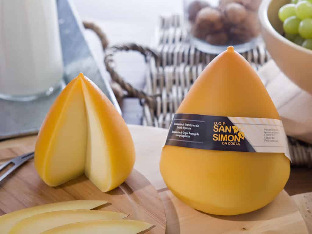 Cylindrical shaped San Simon cheese