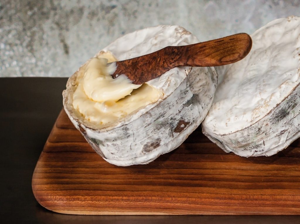 Two wheels of spruce-wrapped Harbison cheese