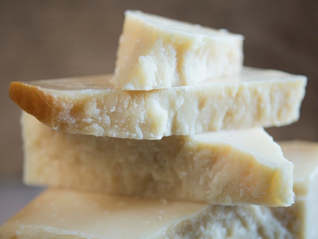 Wedges of Parmigiano Reggiano Italian hard cheese