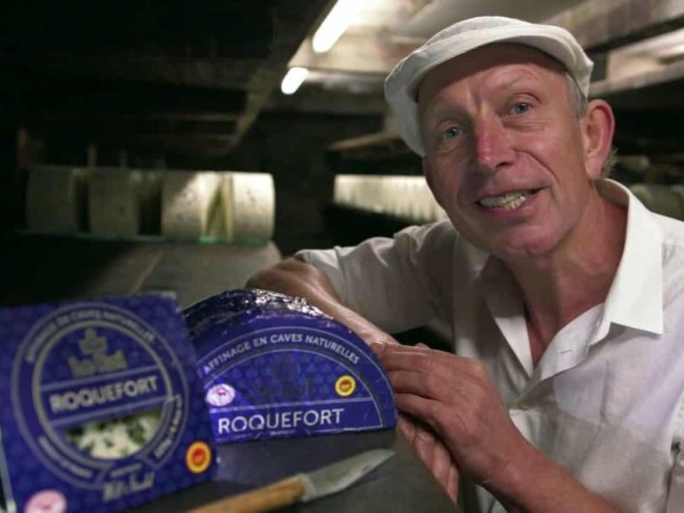 Will Studd with wheels of Roquefort