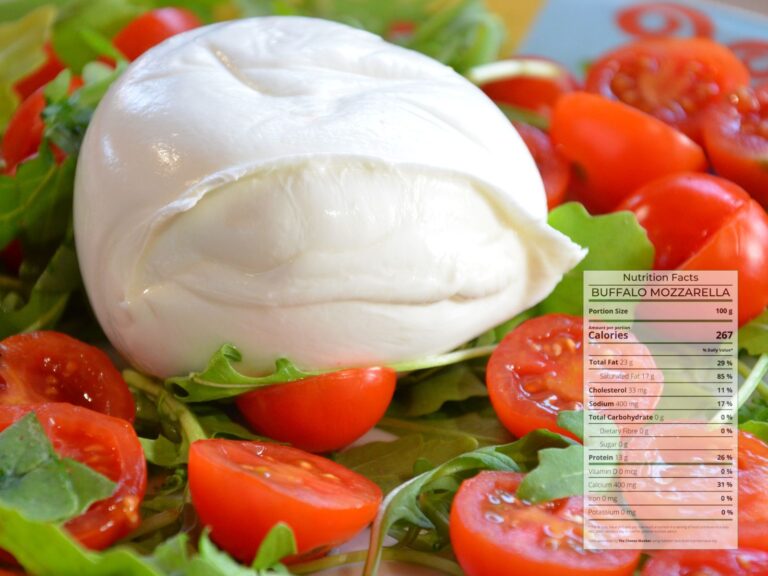 Feature Buffalo Mozzarella on a bed of cherry tomatoes and rocket leaves