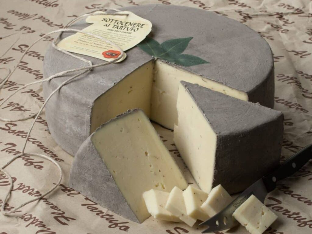 Whole wheel of Sottocenere with natural grey rind