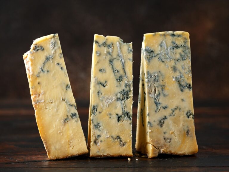 Slices of Stilton blue cheese