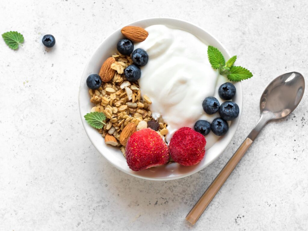 Yoghurt Serving in a bowl with granola and fruit